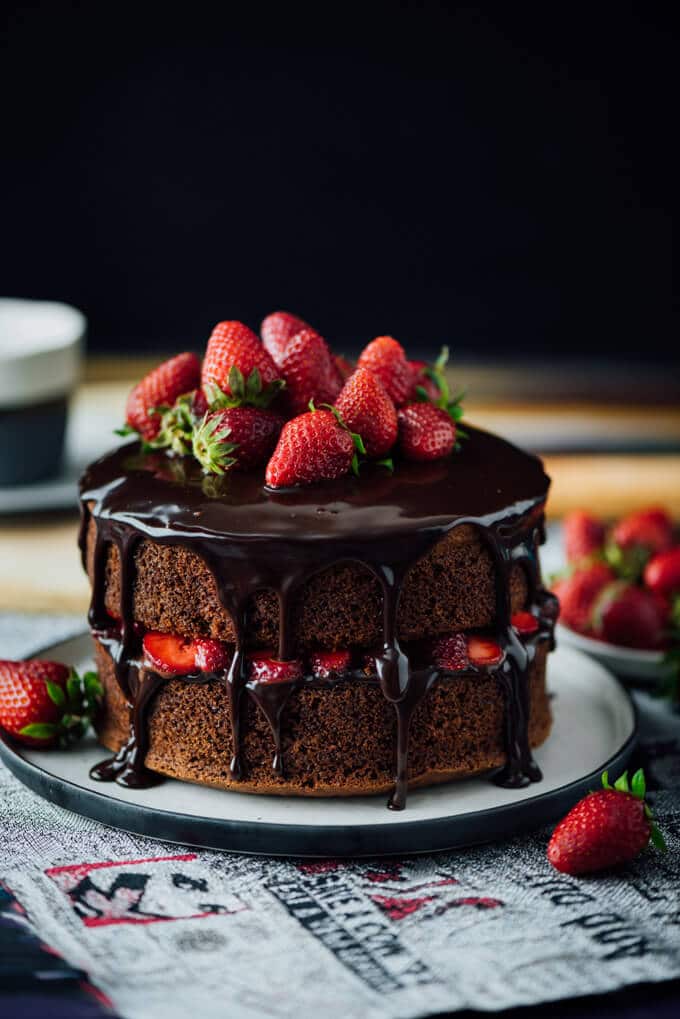 The EASIEST Strawberry Chocolate Cake ever! You just need to add a simple chocolate ganache and strawberries to your favorite chocolate cake recipe.