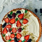 Strawberry cream cheese pie with berries on the side