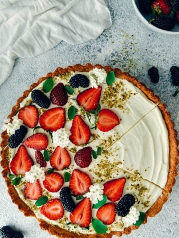 Strawberry cream cheese pie with berries on the side