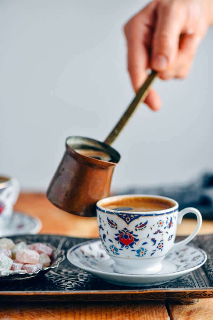 How to make Turkish coffee in a copper coffee pot and serving it in traditional small cups