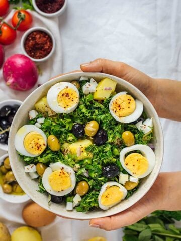 Turkish Potato Salad with herbs and hard-boiled eggs is very light, healthy and refreshing yet so tasty with all the Mediterranean flavors. A little spicy and tangy, this salad is so different from traditional mayonnaise-based potato salads. Perfect for potlucks!