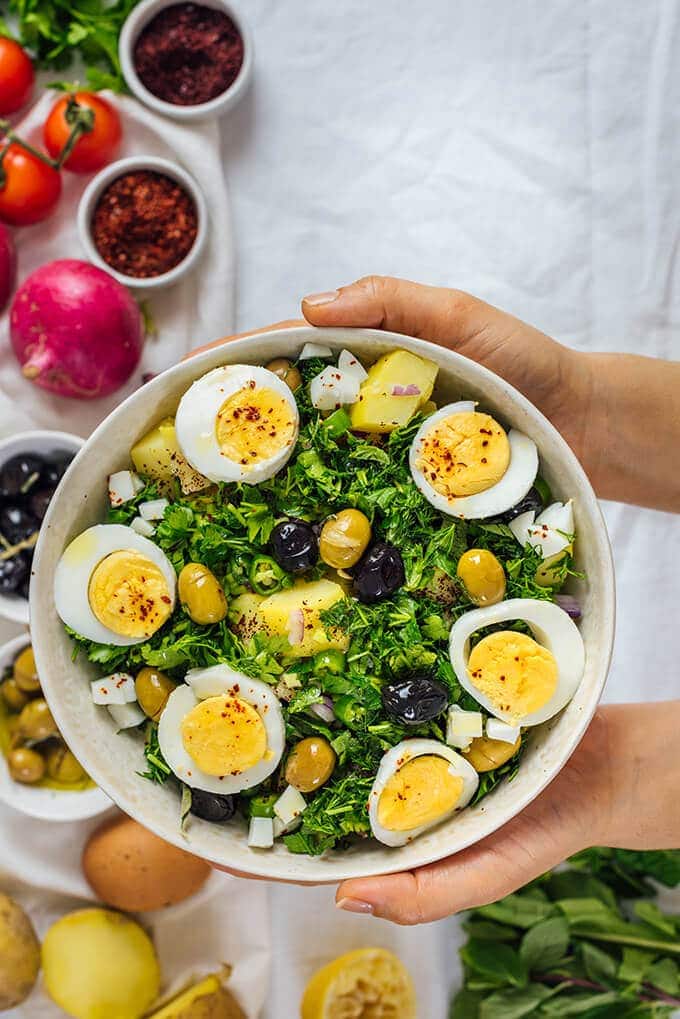 Turkish Potato Salad with herbs and hard-boiled eggs is very light, healthy and refreshing yet so tasty with all the Mediterranean flavors. A little spicy and tangy, this salad is so different from traditional mayonnaise-based potato salads. Perfect for potlucks!