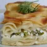 A slice of Turkish water borek stuffed with feta and parsley.