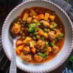 Pinterest image showing a bowl of Turkish Meatball Stew (Sebzeli Köfte) with peas, carrots, and potatoes in tomato sauce, labeled “Sebzeli Kofte – Meatball Stew with Veggies” from giverecipe.com.