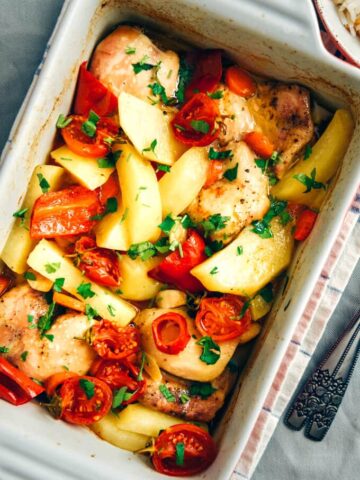 Roasted chicken with potatoes in a casserole pan