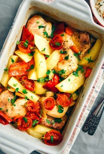 Roasted chicken with potatoes in a casserole pan