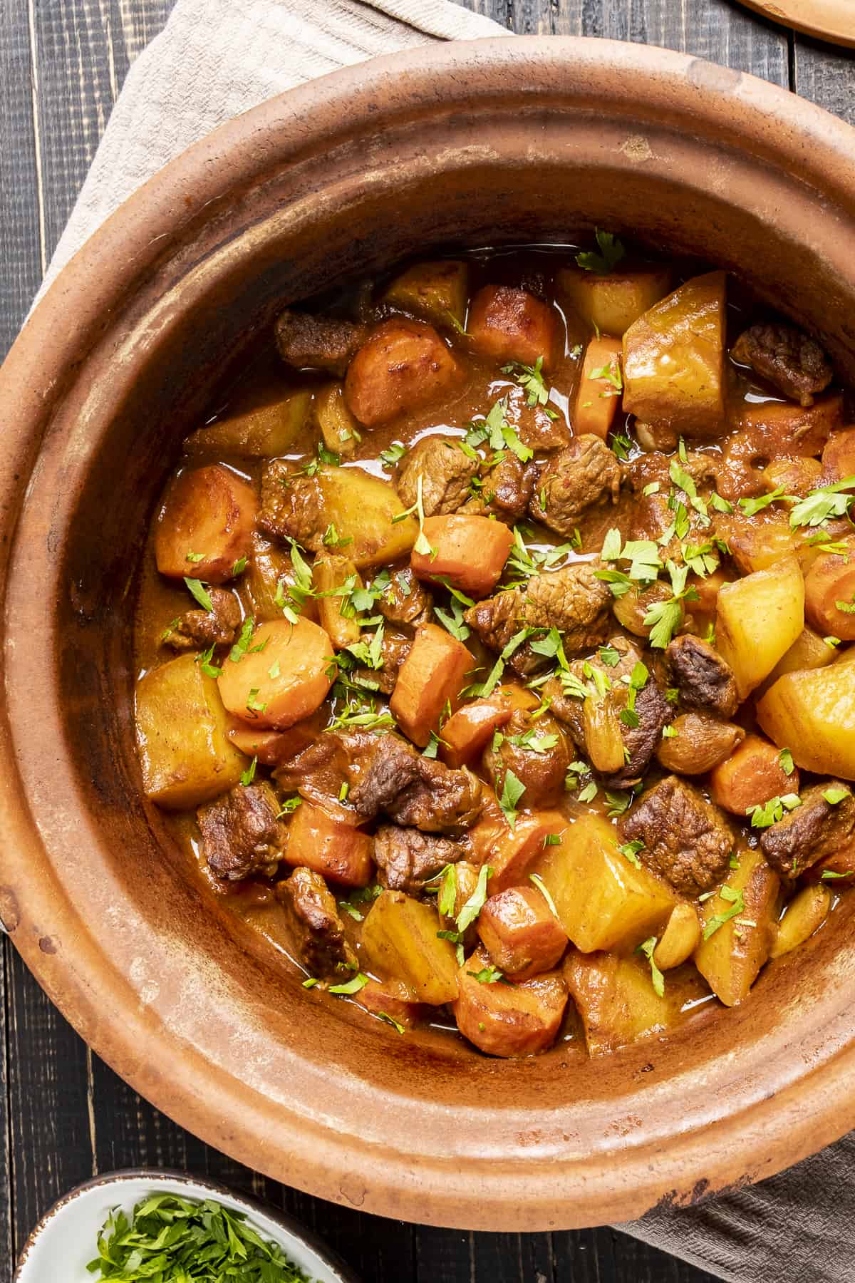 Beef stew with vegetables in a clay pot.