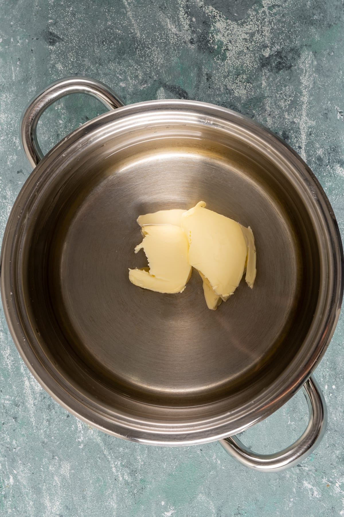 Butter and water in a pan.