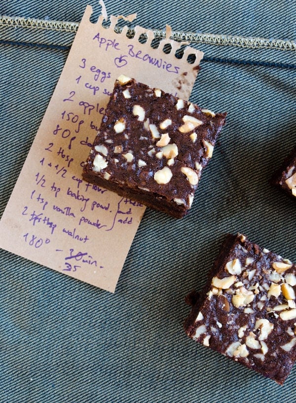 Chocolate brownies with apple topped with walnuts