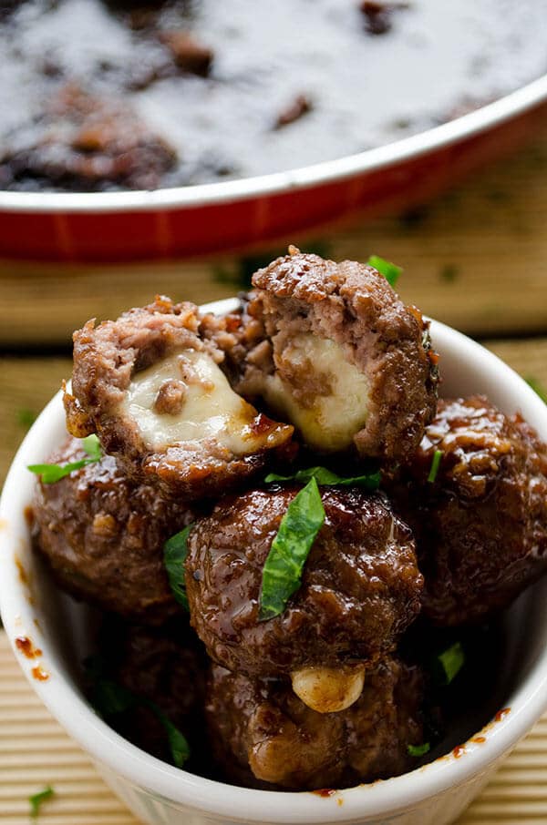 Cheese stuffed meatballs coated with honey and pomegranate molasses