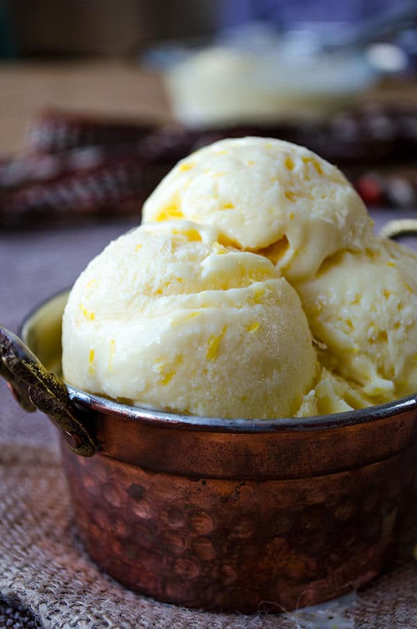 Creamy lemon ice cream loaded with lemon zest and lemon juice. The best refreshing summer treat for lemon lovers.