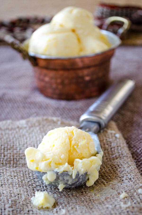 Creamy lemon ice cream loaded with lemon zest and lemon juice. The best refreshing summer treat for lemon lovers.