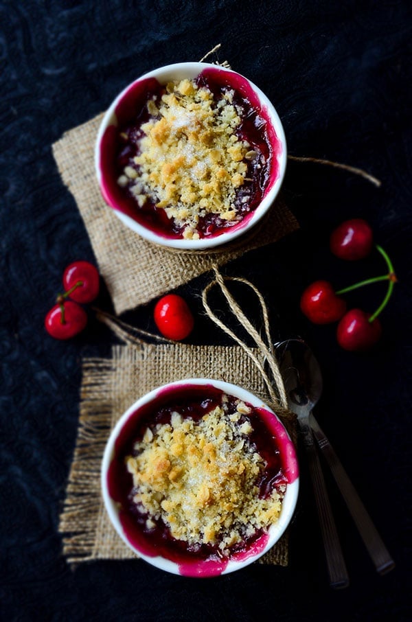 Fresh Cherry Crisp in white ramekins