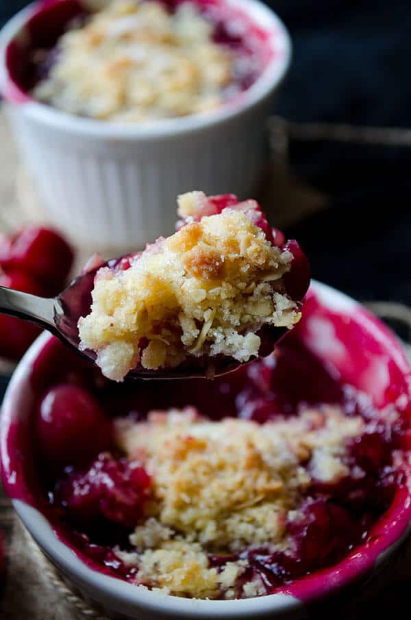 Fresh Cherry Crisp in white ramekins