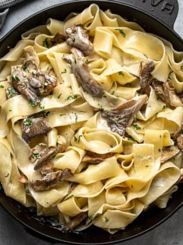 Oyster mushroom pasta in a cast iron skillet.