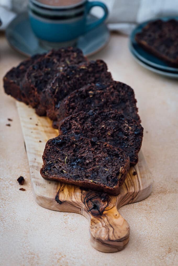 Chocolate zucchini bread served on a wooden board