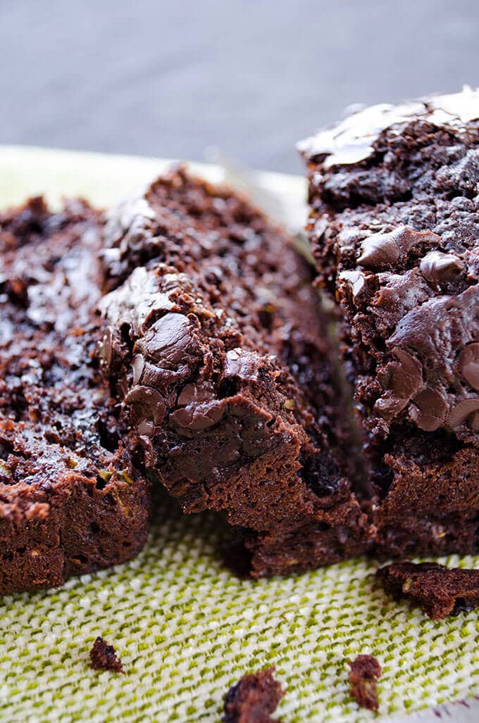 Zucchini is the secret which makes this Chocolate and Yogurt Zucchini Bread wonderfully moist. Do you hear me zucchini haters? I’m pretty sure that you will be making this bread quite often! Zucchini bread with chocolate chips and cocoa powder