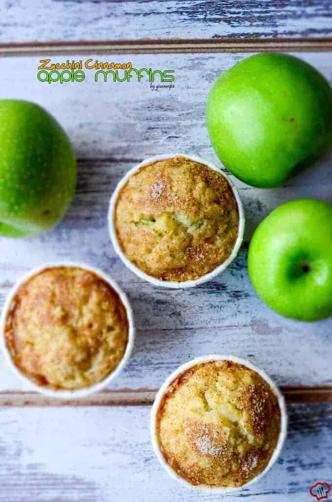 Zucchini Apple Cinnamon Muffins with cinnamon sugar topping. Wonderfully moist thanks to zucchini, applesauce, grated apple and yogurt. Perfect on the go breakfast in fall! #zucchinirecipes #applecinnamonmuffins #fallbaking #zucchinimuffins Zucchini Cinnamon Apple Muffins with Granny Smith apples