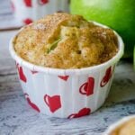 Zucchini Cinnamon Apple Muffins in muffin liners with heart shapes