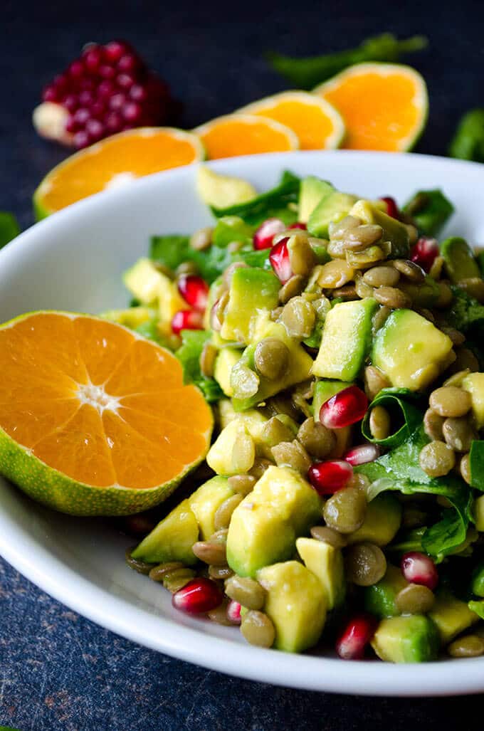 This Green Lentil Salad is packed with vitamins, so perfect for chilly fall days. This vegan and gluten free salad is a real immune system booster! #vegetarian #lentilsalad #greenlentil #vegansalad #healthysalad Vegetarian Lentil Salad with fall fruit and avocado