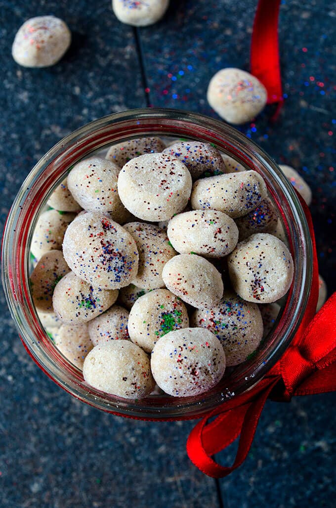 Christmas meltaway cookies with sprinkles in a jar