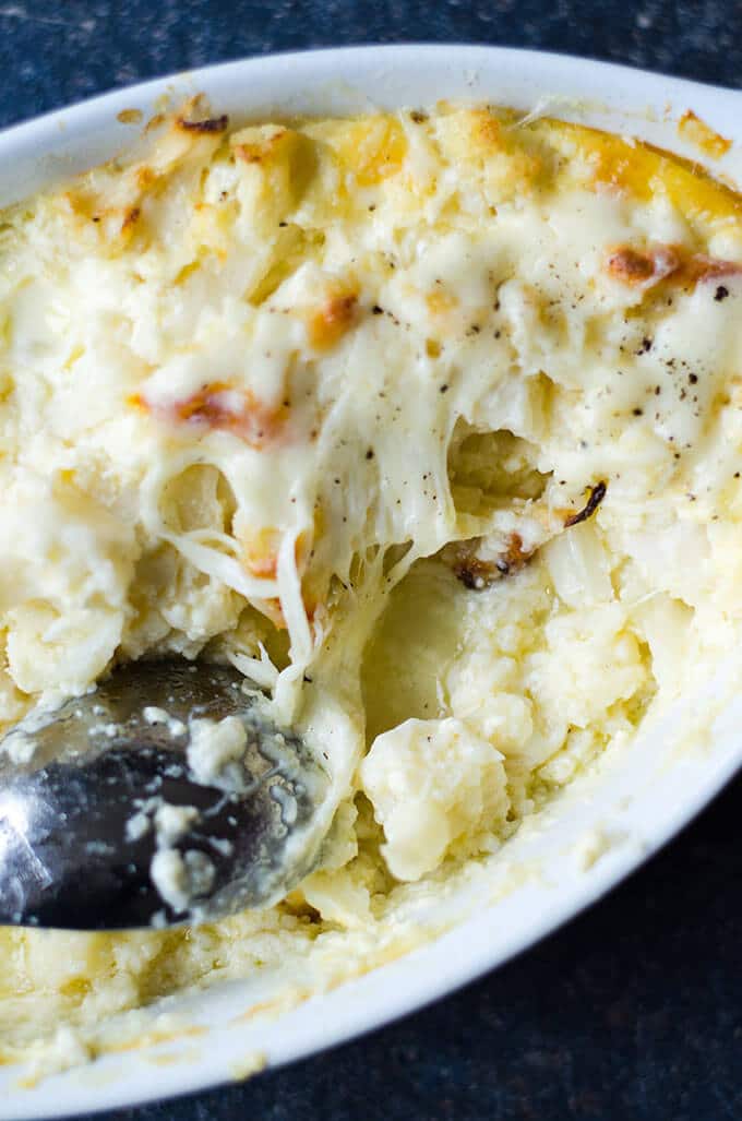 Cheesy cauliflower bake in a baking pan