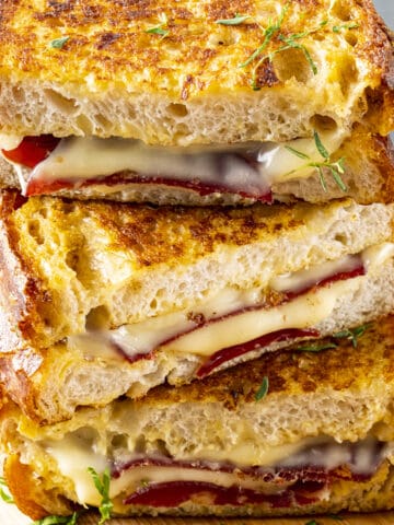 A stack of grilled cheese sandwiches.