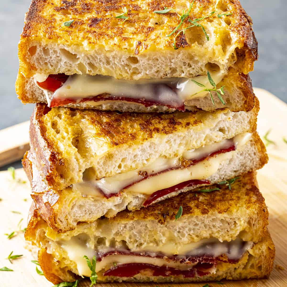 A stack of grilled cheese sandwiches.