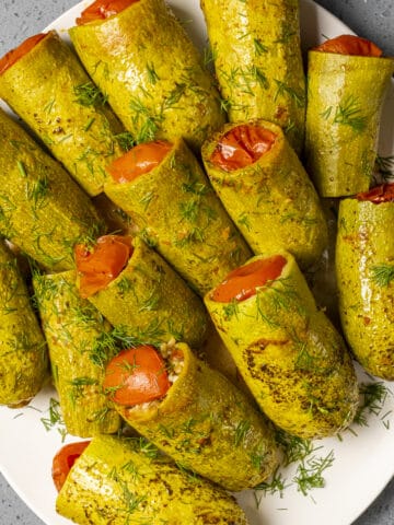 Kabak dolmas on a white plate.