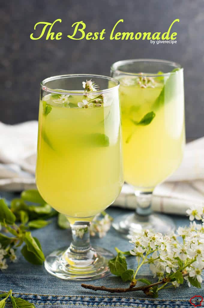 Ginger mint lemonade served with spring blossoms in two glasses