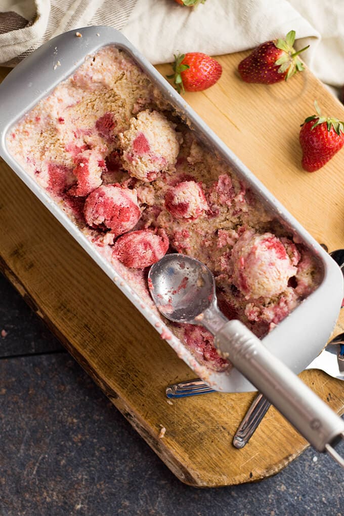 try this recipe if you like strawberry, ice cream and cheesecake. Imagine all three in one. This will become your favorite summer time treat! #summerrecipe #icecreamrecipe #cheesecakeicecream Strawberry Cheesecake Ice Cream Recipe in a loaf pan