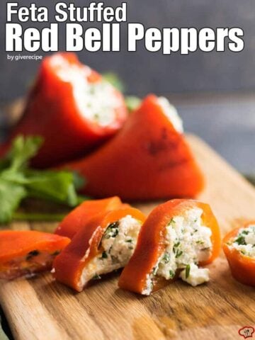 Feta Stuffed Red Bell Peppers make perfect appetizers for parties. Roasted red bell peppers are filled with a mixture of feta and greek yogurt. - giverecipe.com