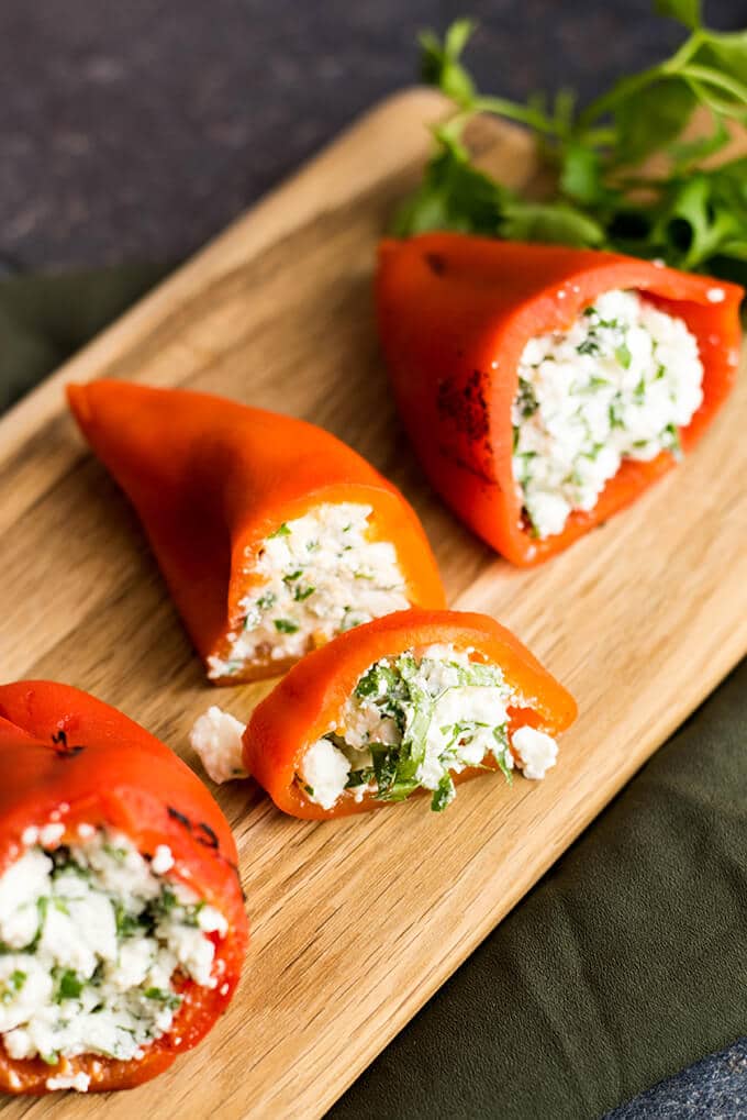 Feta Stuffed Red Bell Peppers make perfect appetizers for parties. Roasted red bell peppers are filled with a mixture of feta and greek yogurt. - giverecipe.com