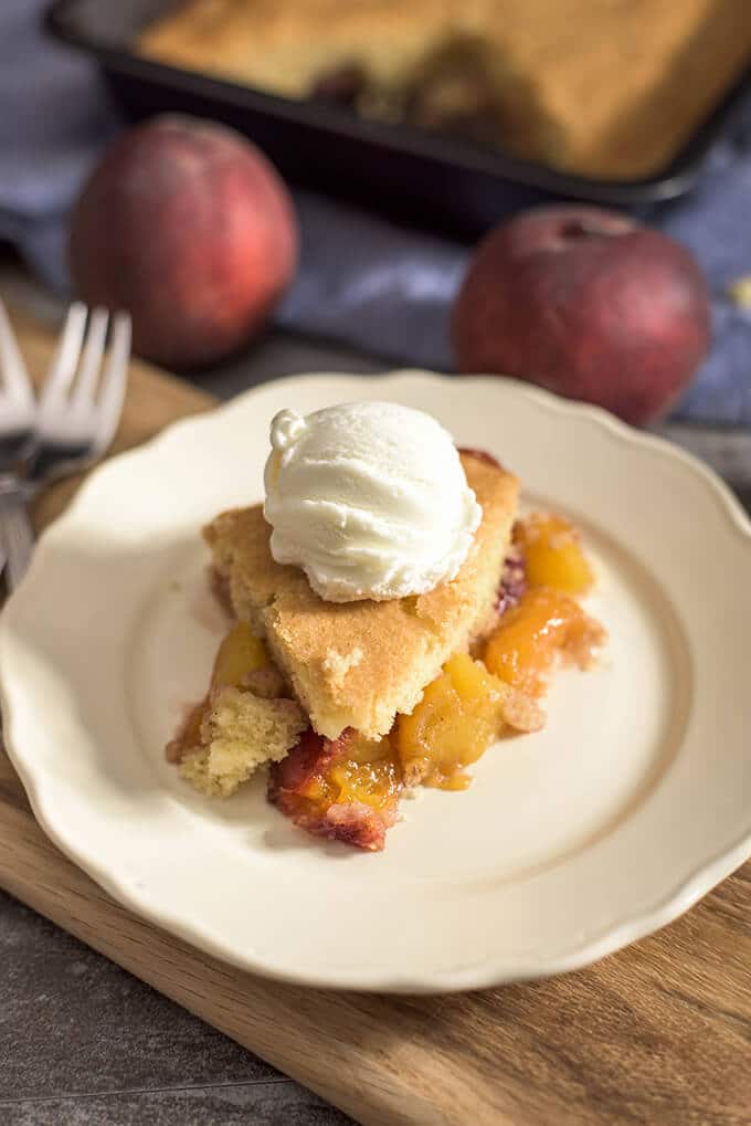 Fresh peaches and easy homemade crust make this yummy Old Fashioned Peach Cobbler. There will be no leftovers when served warm with vanilla ice cream!