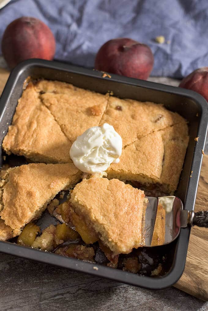 Fresh peaches and easy homemade crust make this yummy Old Fashioned Peach Cobbler. There will be no leftovers when served warm with vanilla ice cream!