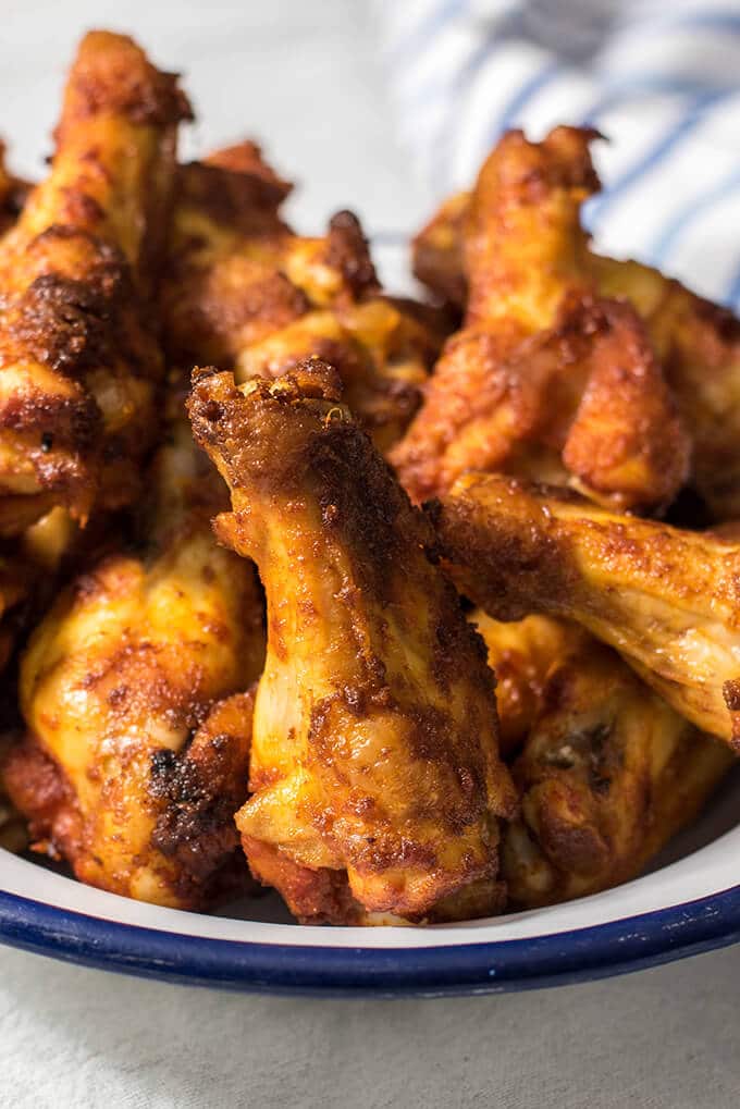 Crispy Buffalo Wings baked in oven. Very crispy thanks to a secret ingredient. You'll no longer want to fry them. - giverecipe.com 