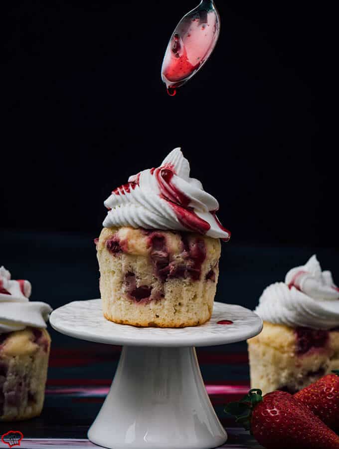 Greek Yogurt Strawberry Cupcakes. Loaded with fresh strawberries. Not one of those cupcakes that are creamy on the top yet dry on the bottom. Wonderfully moist!