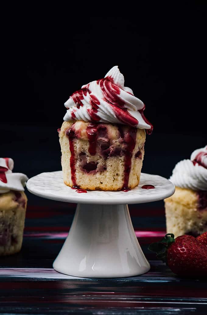 Greek Yogurt Strawberry Cupcakes. Loaded with fresh strawberries. Not one of those cupcakes that are creamy on the top yet dry on the bottom. Wonderfully moist!