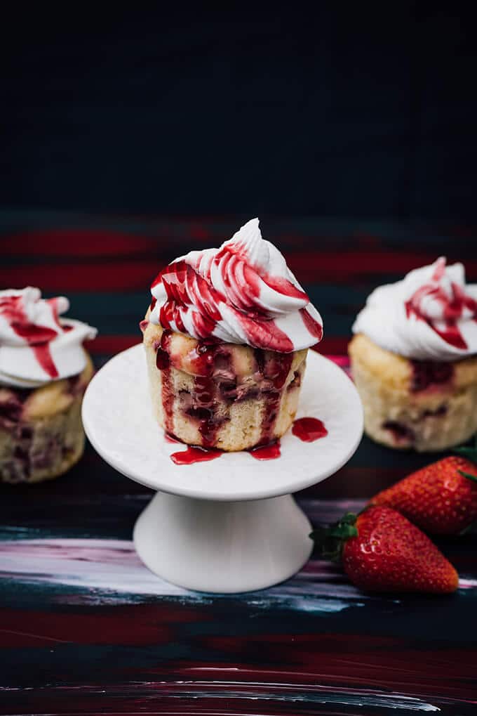 Greek Yogurt Strawberry Cupcakes. Loaded with fresh strawberries. Not one of those cupcakes that are creamy on the top yet dry on the bottom. Wonderfully moist!