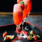 Strawberry lime champagne is a perfect cocktail with 3 ingredients only. Tasty, fancy and refreshing! Try it for your next celebration or weekend brunch.