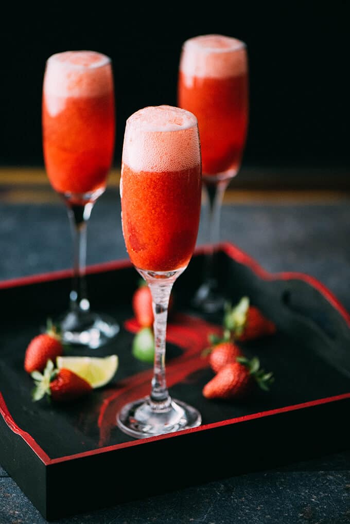 Strawberry champagne in flute glasses