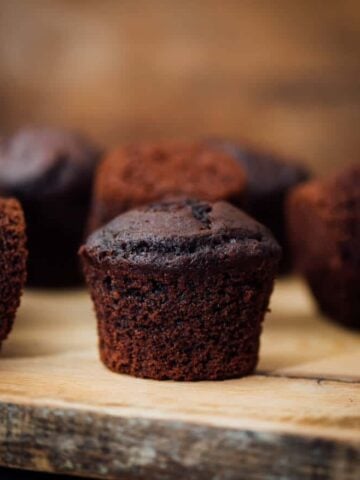 Buttermilk Chocolate Muffins on a wooden board