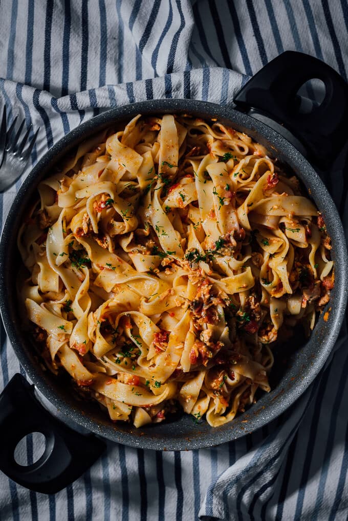 Fettucine with Salmon and Tomatoes can easily elevate any boring weeknight dinner. This is definitely a recipe your family asks for very often, if not every day. #sponsored