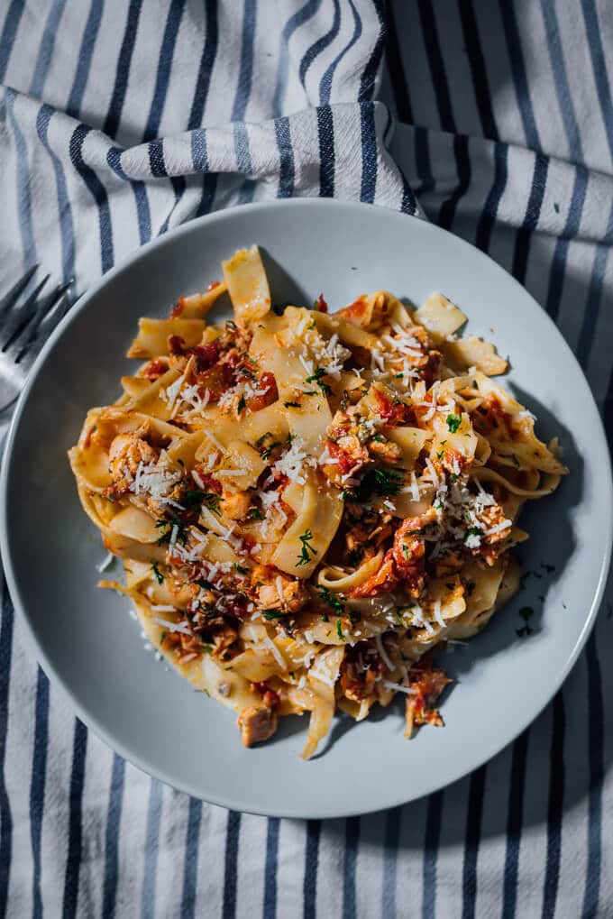 Fettucine with Salmon and Tomatoes can easily elevate any boring weeknight dinner. This is definitely a recipe your family asks for very often, if not every day. #sponsored