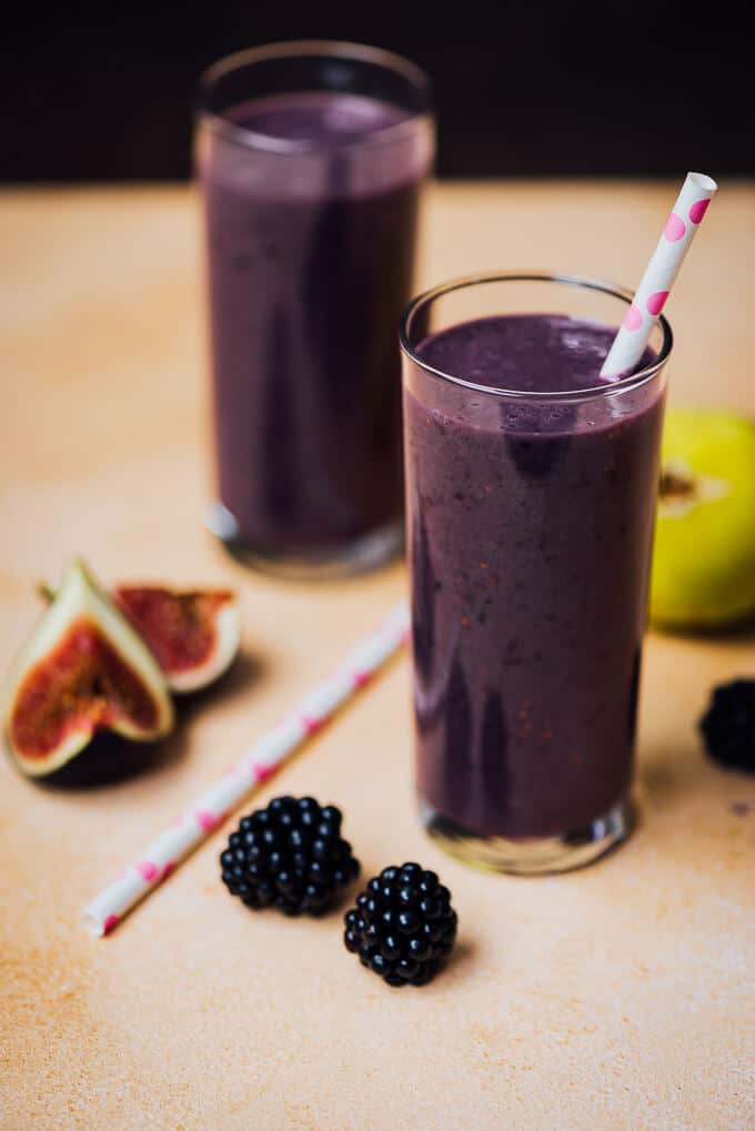Blackberry Fig Kefir Smoothie in two glasses with white and pink straws
