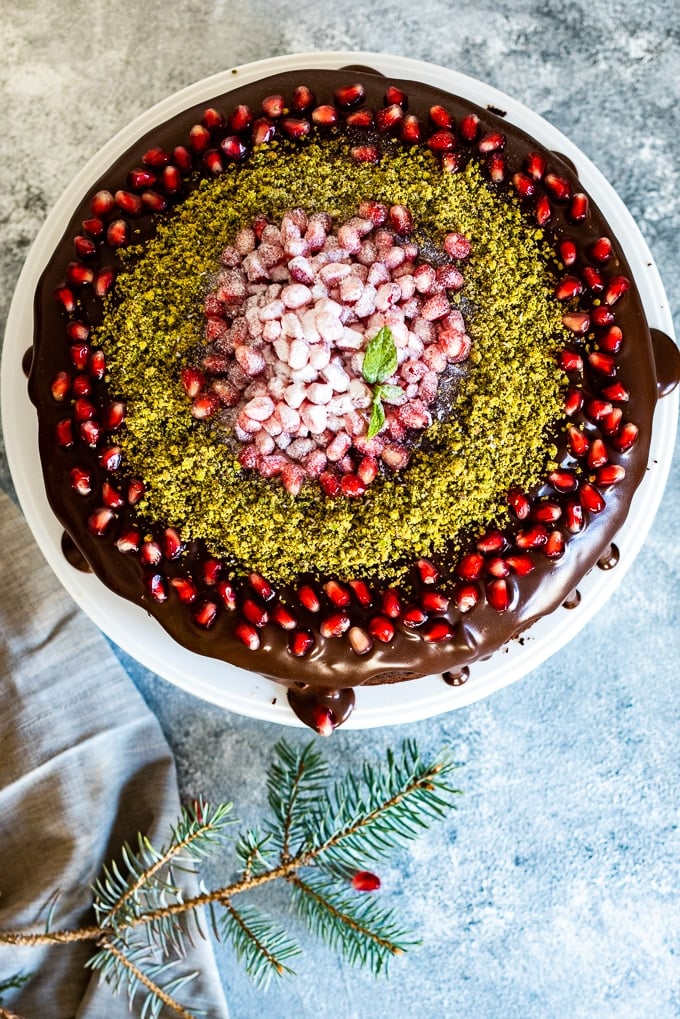 Chocolate cake for Christmas on a cake stand.