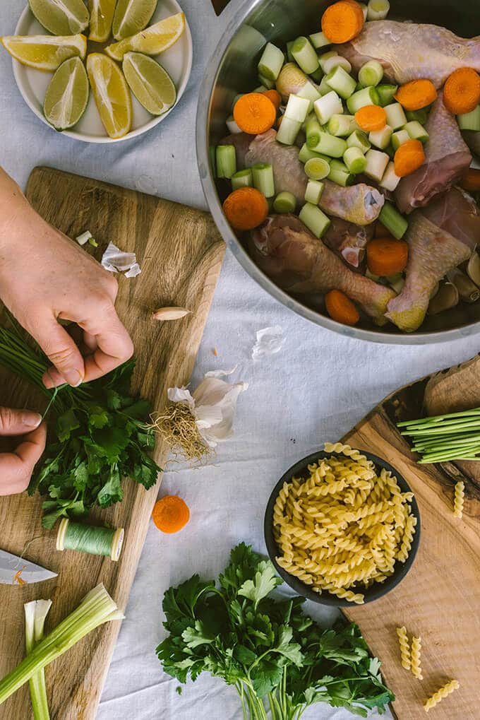 Winter Vegetable Chicken Noodle Soup is super hearty, healthy and easy to make. Packed with chicken, winter vegetables and noodles. #chickennoodlesoup #chickensoup #soupforacold #comfortingsoup Chicken noodle soup from scratch photographed in steps