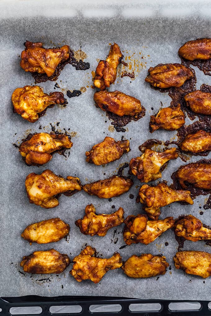 Sticky Baked Chicken Wings are so addictive with their sweet, tangy and spicy sauce. It’s so hard to stop eating these when they are double-dipped into the sauce.