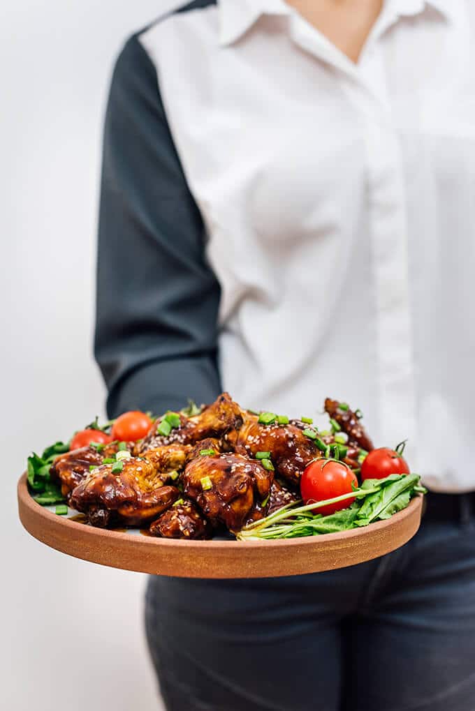 Sticky Baked Chicken Wings are so addictive with their sweet, tangy and spicy sauce. It’s so hard to stop eating these when they are double-dipped into the sauce.