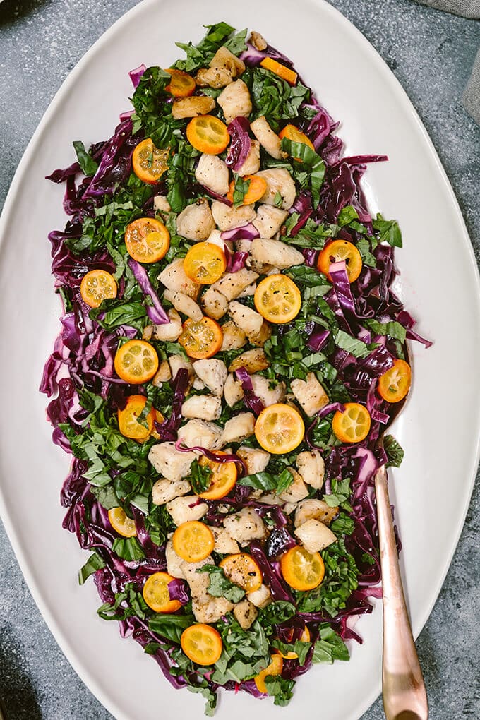 Chicken Cabbage Salad with Basil and Kumquats is guaranteed to be your favorite salad for summer parties. The unexpected combination of flavors results in a phenomenal salad that everyone devours. #ad #TheRecipeisSimple